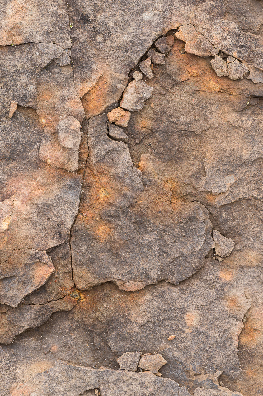 Fractured basalt on an Oregon coast beach;  ancient lava flows left deposits of basalt along regions of the Oregon coast. Image...